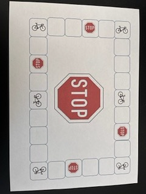 Lesmateriaal spelbord stopbord fietsen van auteur juf Anneke