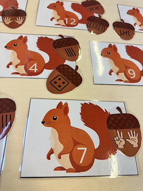lesmateriaal Herfst - eikels naar de juiste eekhoorn (getalbeeld t/m 12) van auteur De klas van juf Michelle